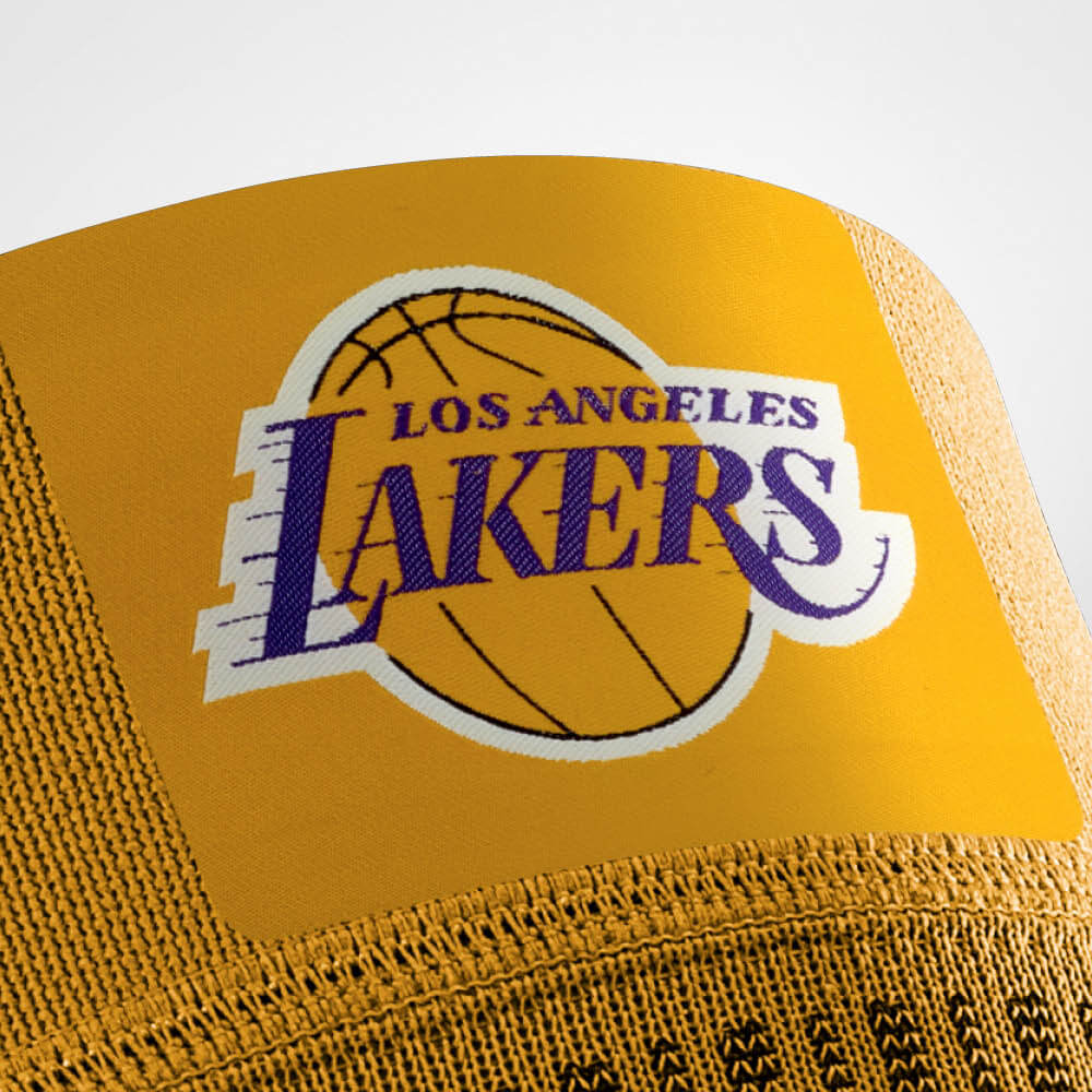 Close-up of Los Angeles Lakers logo on yellow background