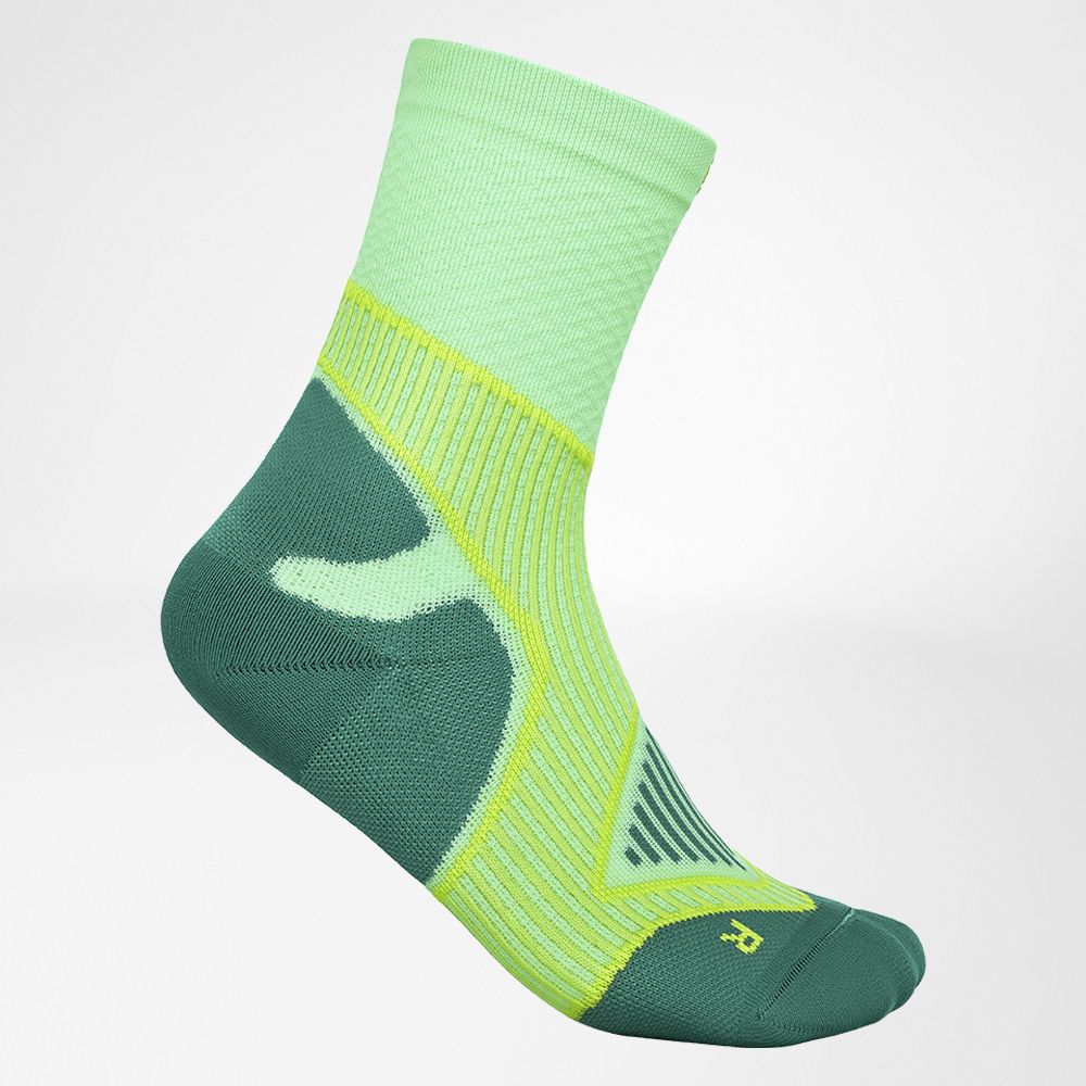 Image of woman wearing the Outdoor Performance Midcut Socks