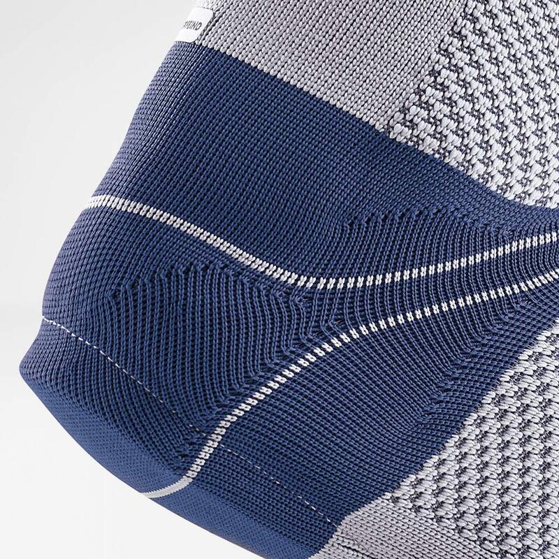 Bauerfeind AchilloTrain Active Support Brace Box - Achilles Tendon Pain Relief Packaging box of Bauerfeind AchilloTrain Achilles tendon support brace with focus on the visco-elastic pad feature and multilingual descriptions.