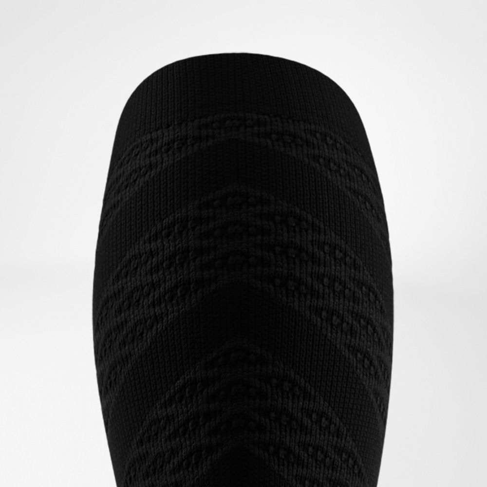 Upper edge of the black Run Performance Compression Socks.