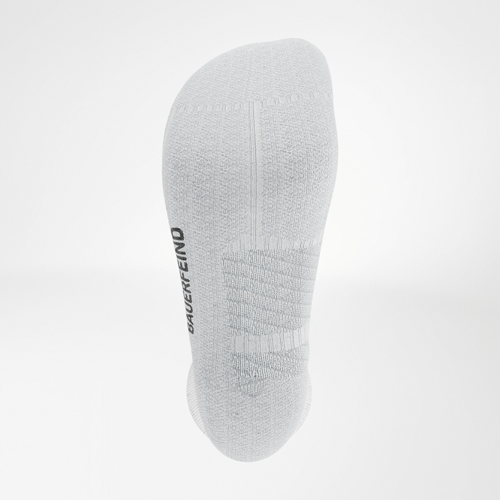 Sole of the white Run Performance Compression Socks' Run Comfort Zone.