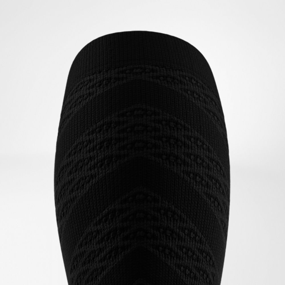 Posterior upper edge of the black Run Performance Compression Sleeves.