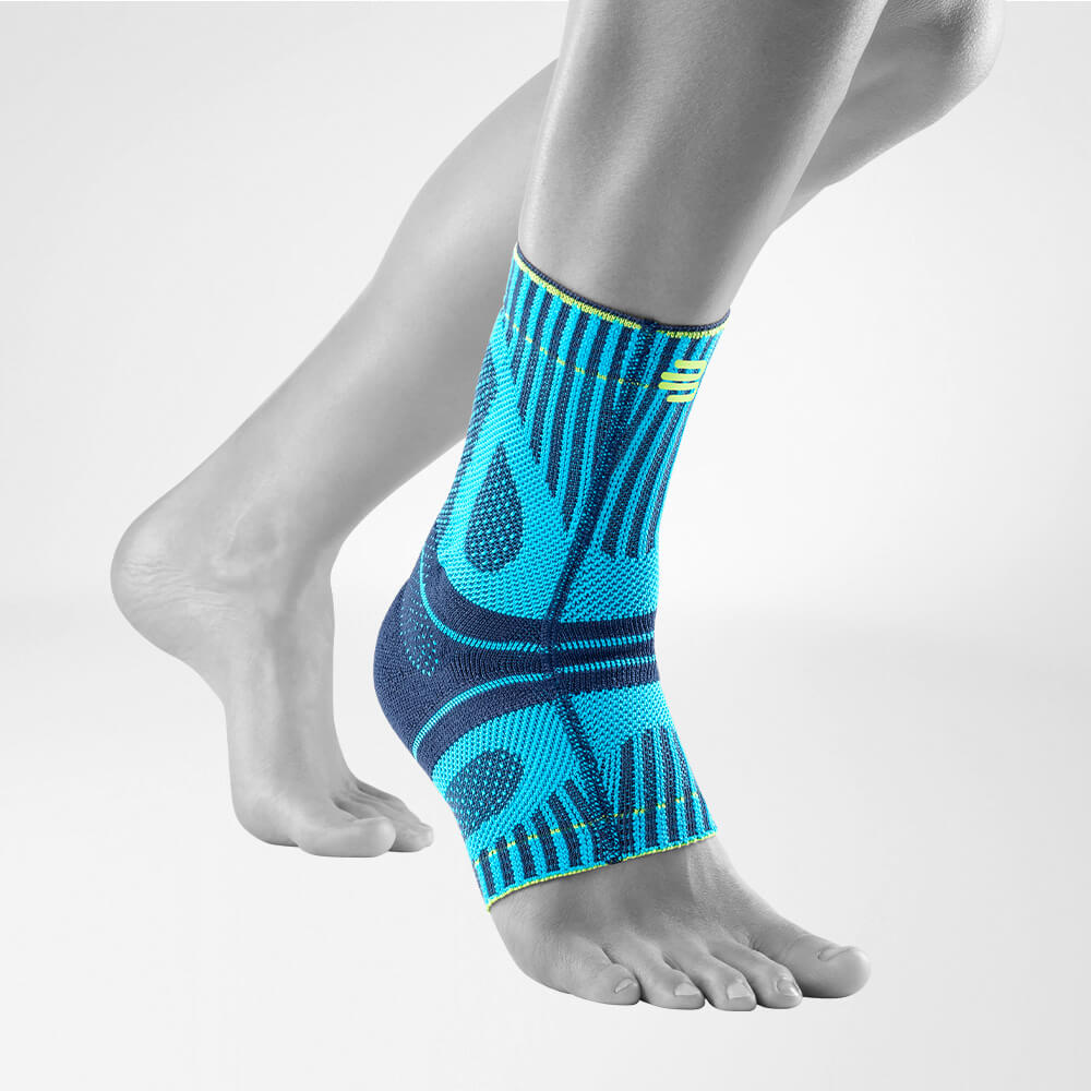 Ankle Compression Brace in Blue for Support Blue achilles brace on foot and lower leg for support and injury prevention