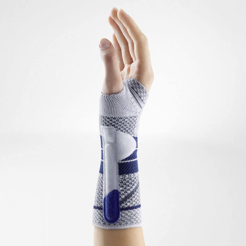 Side of ManuTrain (Titan) Without Two-Part Strap System Side of a person's hand while wearing Bauerfeind's ManuTrain wrist brace without its two-part strap system.