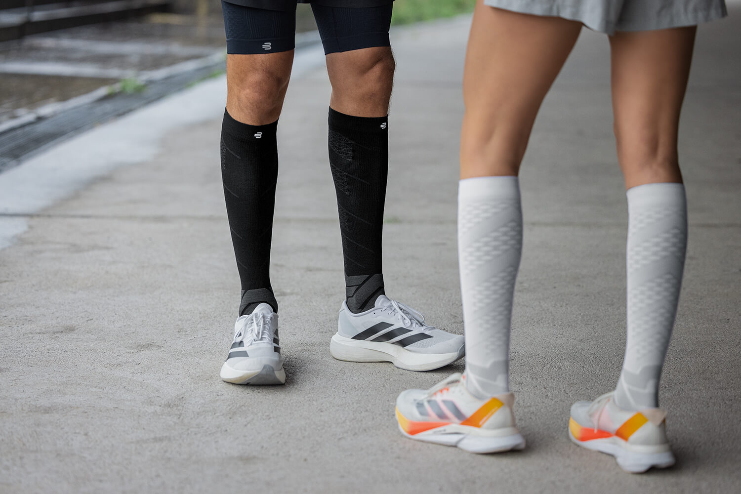 Runner wearing Run Performance Socks running up steps