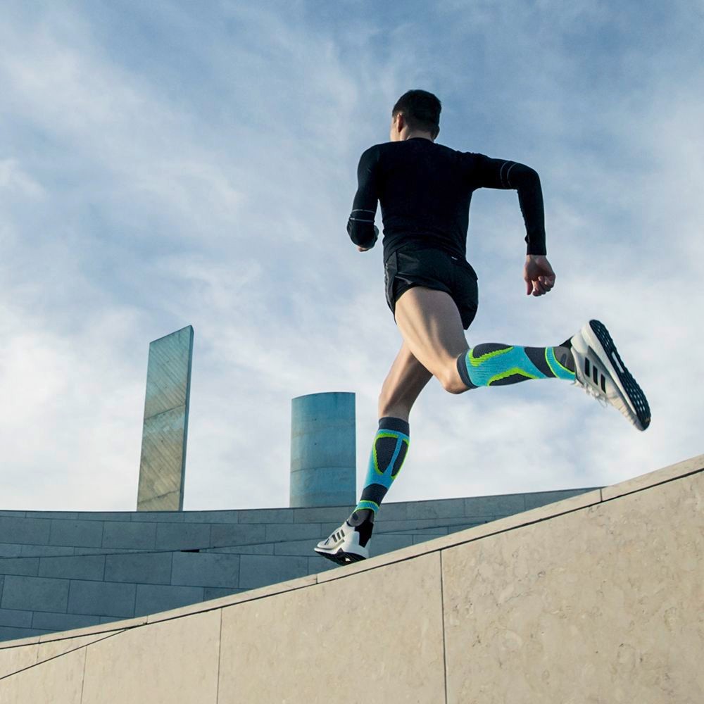 Image of man athlete wearing Run Performance Compression Socks