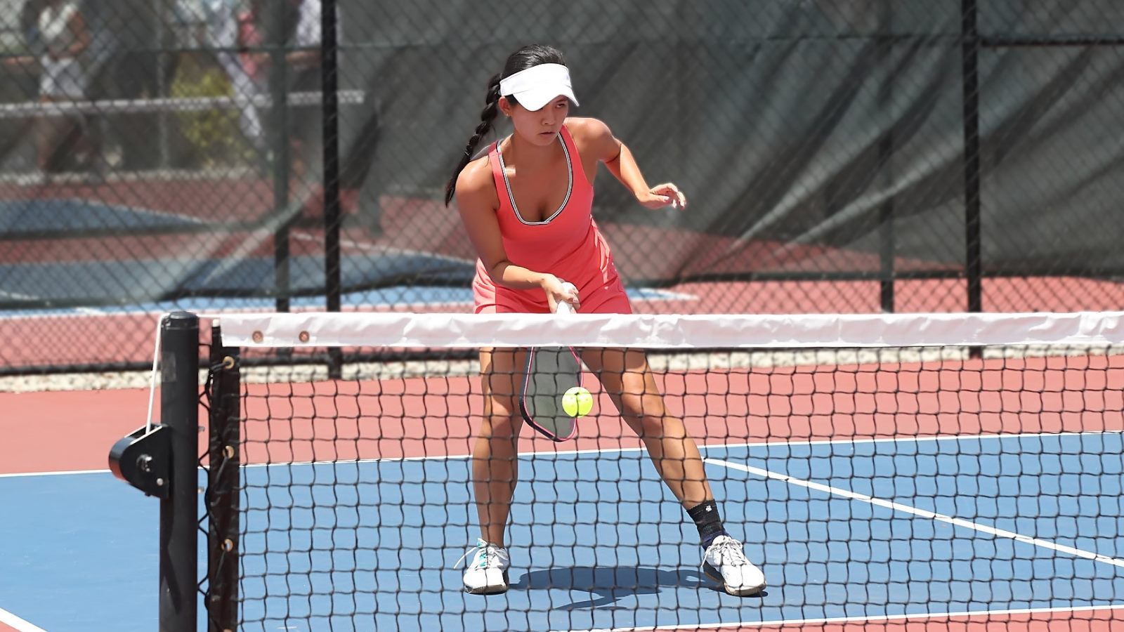 Pickleball Pro Alia Brown Wearing the MalleoTrain Ankle Brace APP Tour Pro Alia Brown wearing Bauerfeind's MalleoTrain ankle brace while playing pickleball outdoors.