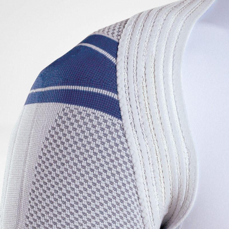 Close-up image of the Train knit fabric and delta pad used for Bauerfeind's OmoTrain shoulder brace.