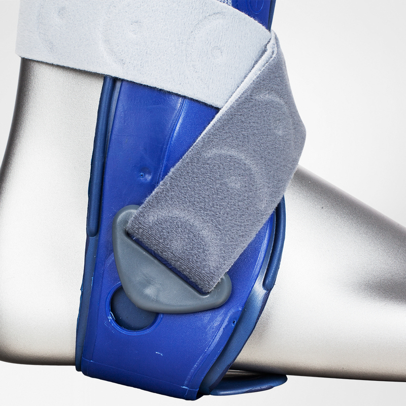 Easy Donning  Close-up of a blue MalleoLoc Ankle Stirrup Brace with gray Velcro straps.