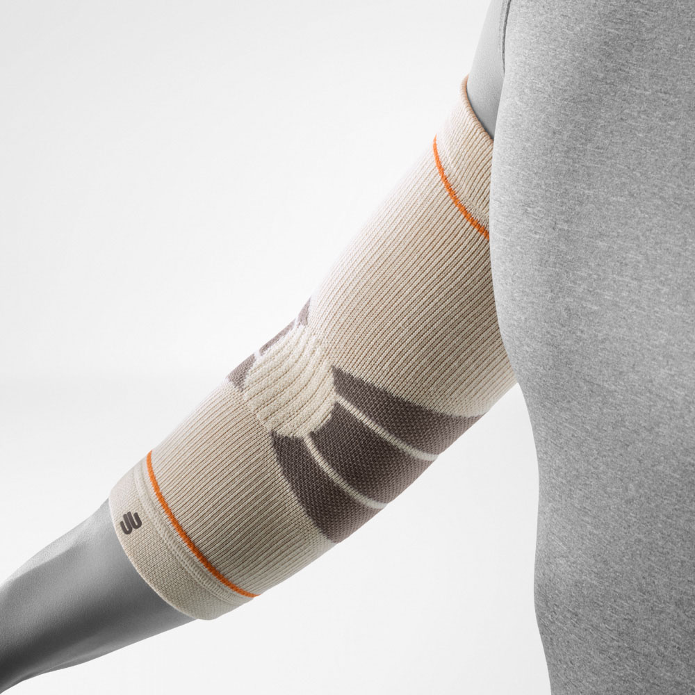 Inner view of Bauerfeind's Outdoor Compression Elbow Support in Sandstone color.