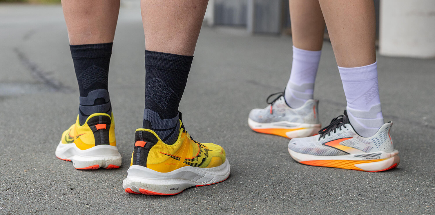 Runner wearing Run Performance Socks running up steps