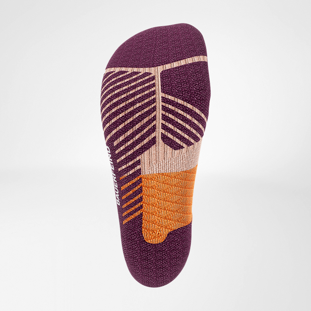 Close-up of a high-performance running sock with breathable fabric and targeted cushioning in purple, orange, and beige colors isolated on a white background