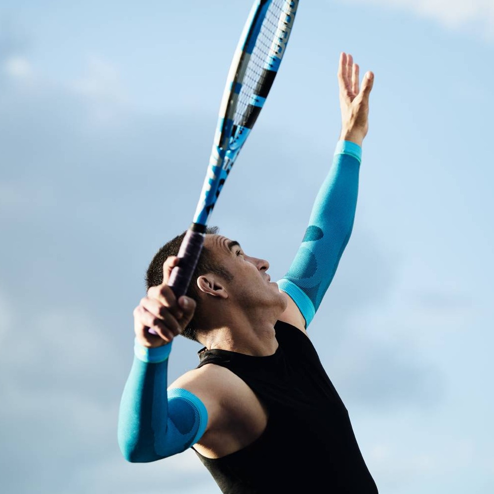 Image of tennis player wearing Sports Compression Sleeves Arm