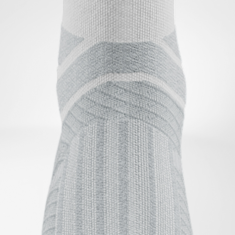Ventilation zone of the white Run Performance Compression Socks.