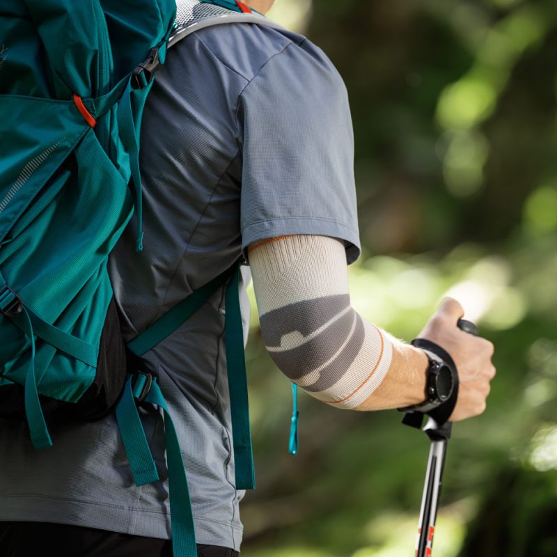 Hiker wearing the Outdoor Compression Elbow Sleeve
